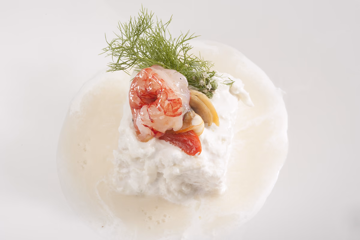 La ricetta della vellutata con cozze, vongole, gamberi e pane cafone
